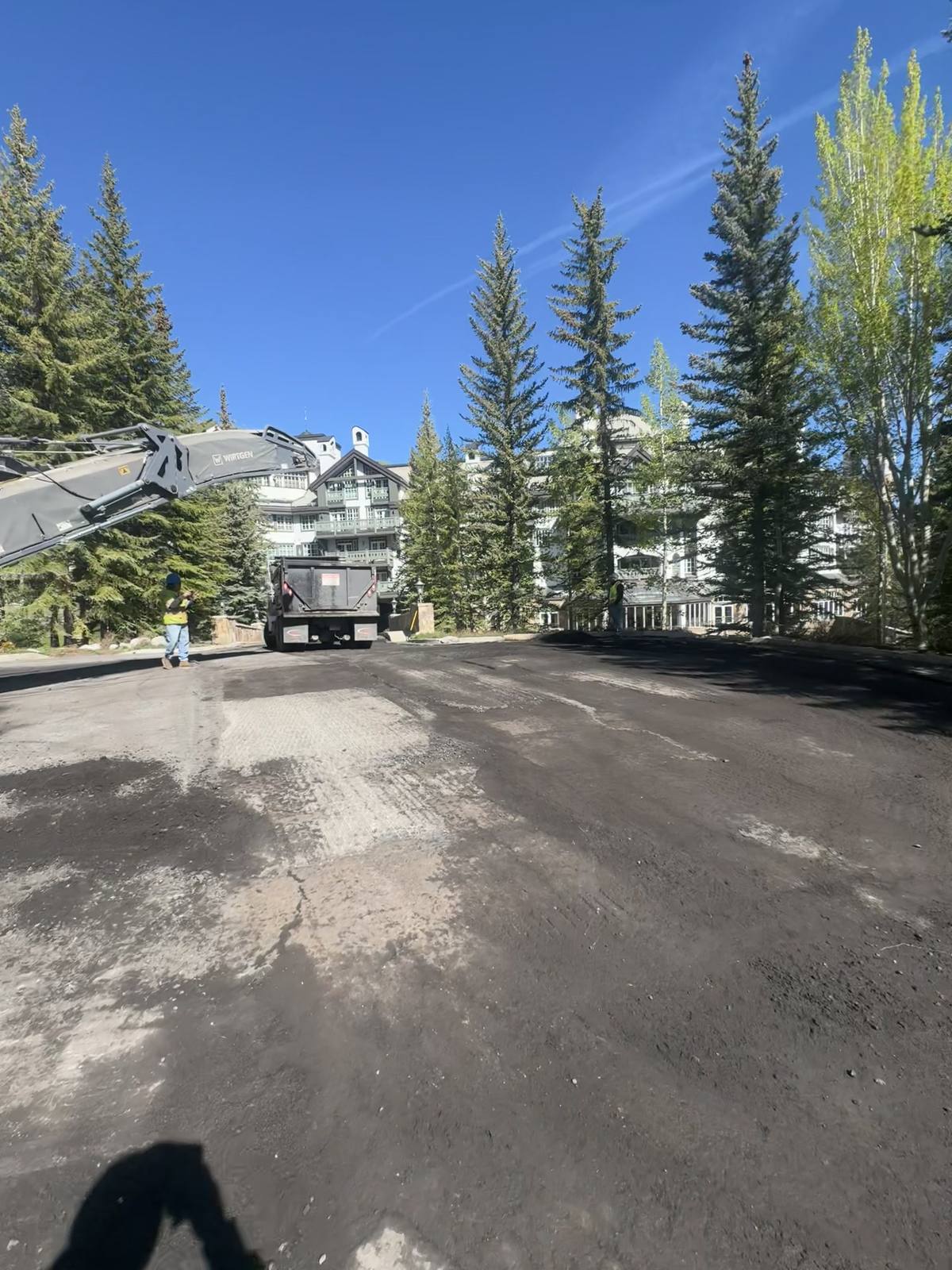 Milling the old surface off a lot before the new mat goes down.